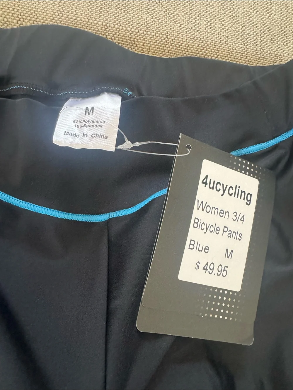 NWT 4UCycling Woman’s Padded Cycling Capris - Black w Blue trim